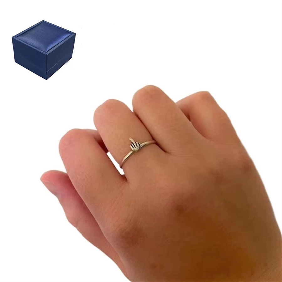 ring on middle finger woman