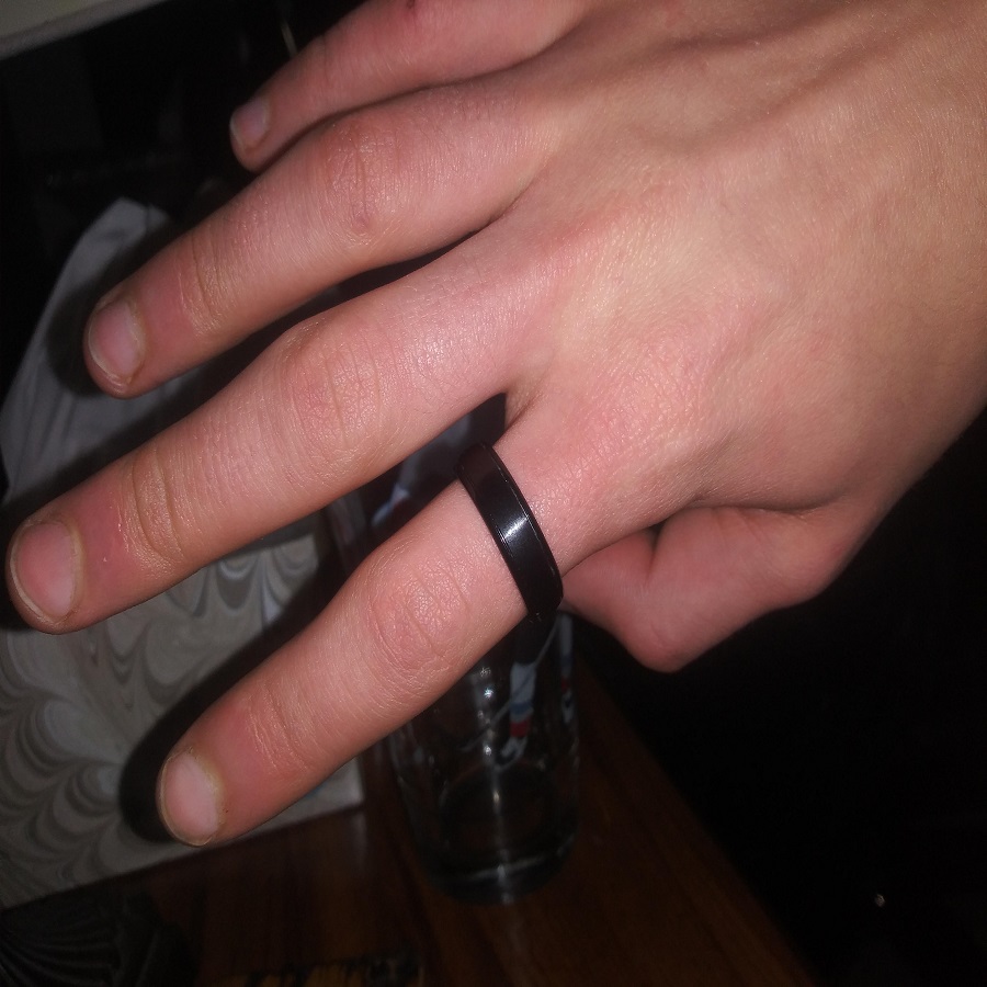 black ring on right ring finger